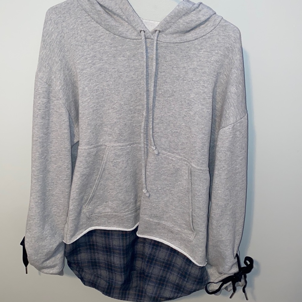 Sweatshirt with flannel underlay attached